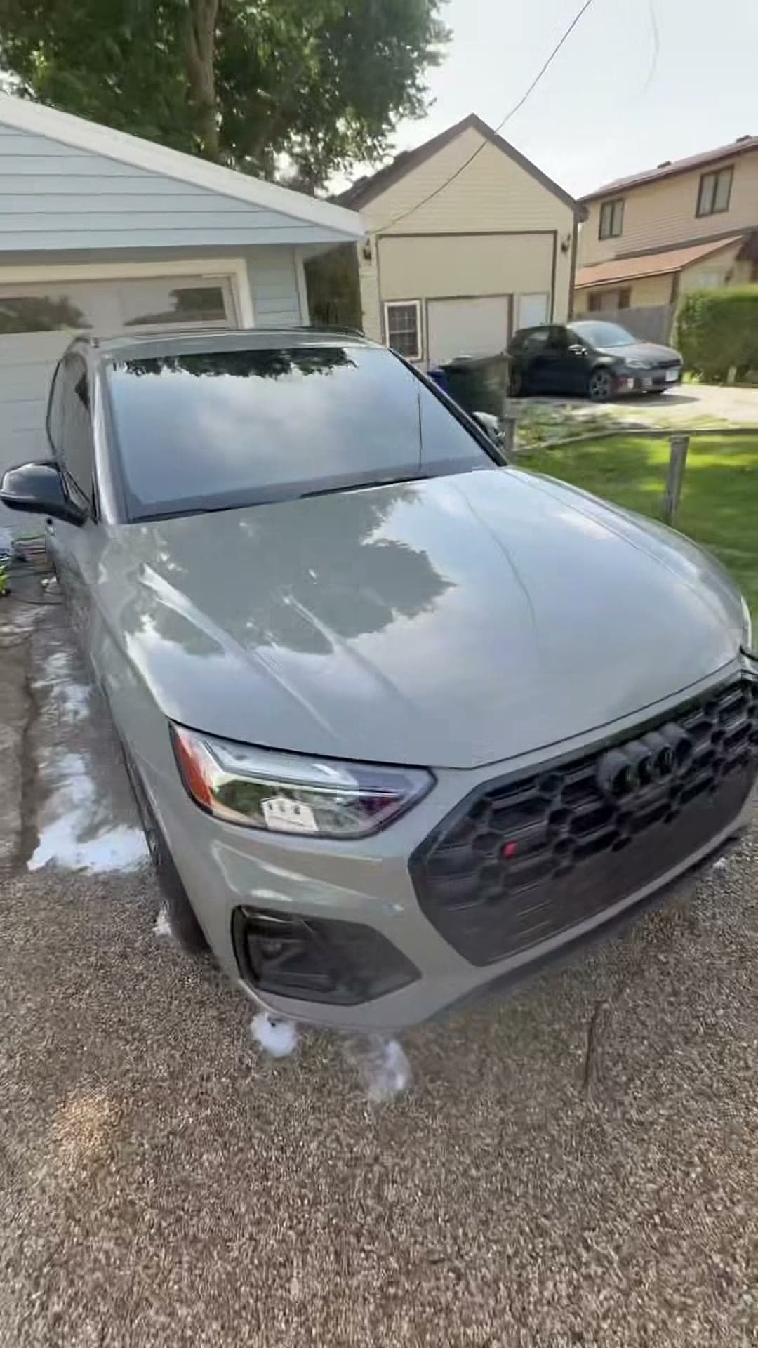 Finished gray Audi SUV viewed from the front corner